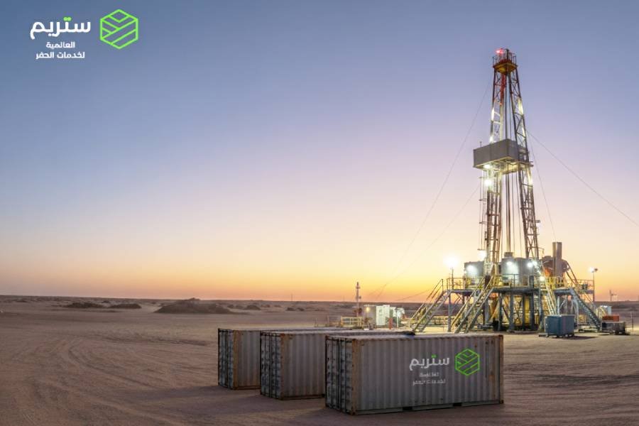 Onshore rig and equipment at dusk
